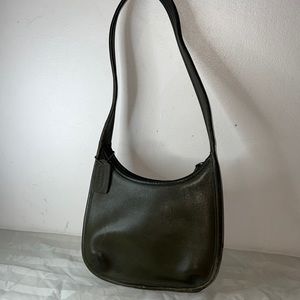Small green vintage coach bag.